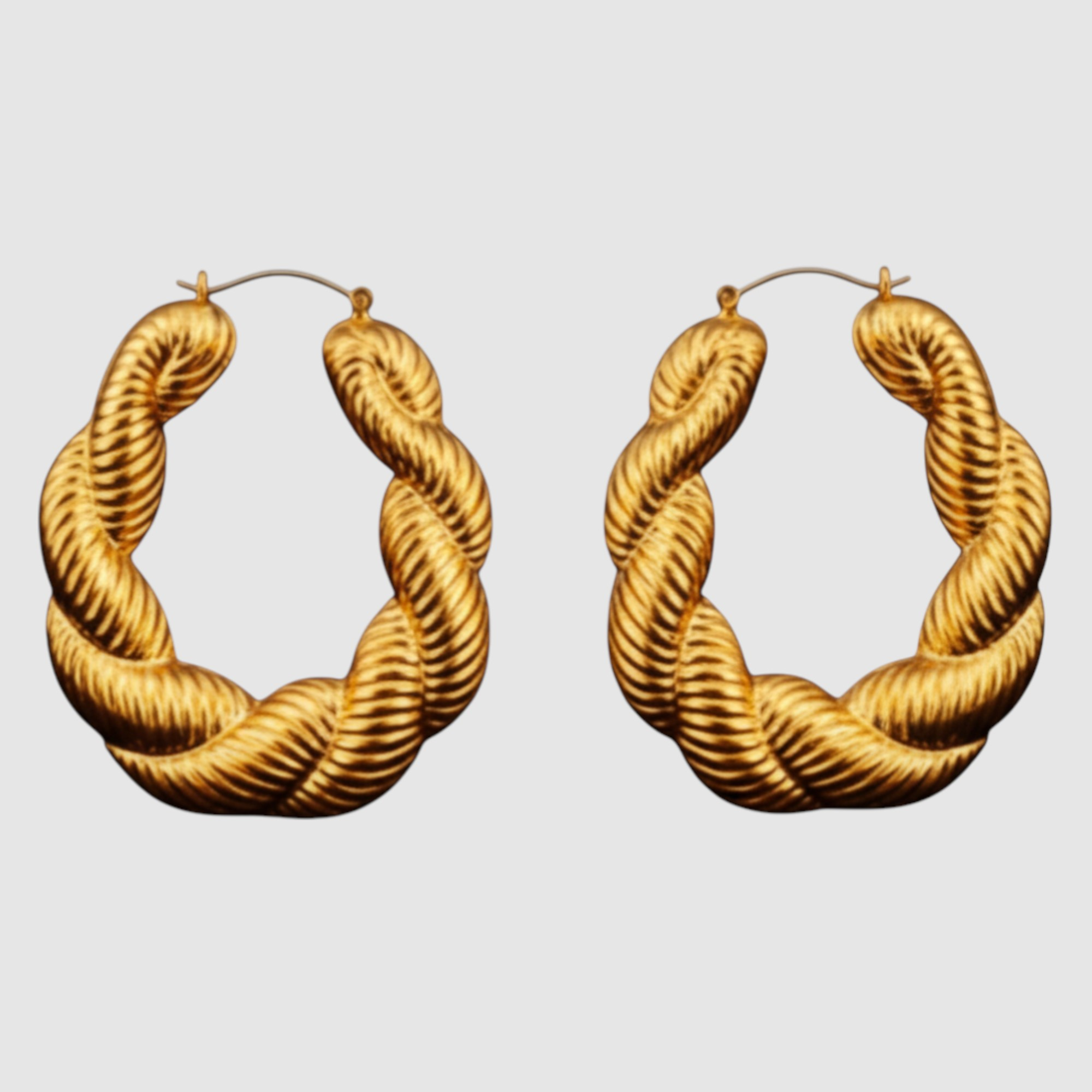 Aretes Tipo Argolla Trenzada en Oro Laminado 14K – Diseño Clásico y Sofisticado