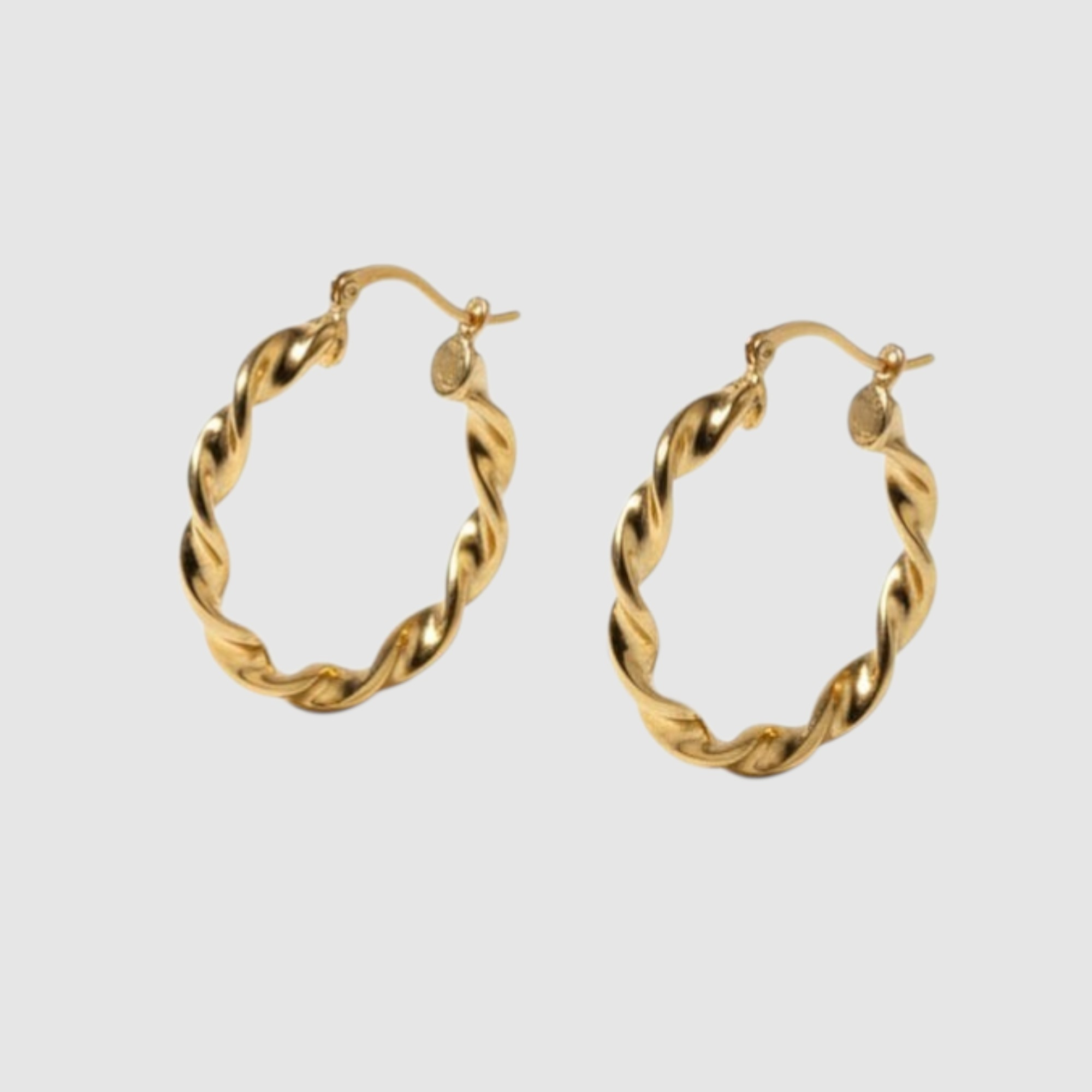 Aros Retorcidos en Oro Laminado 18K – Pendientes Circulares Elegantes