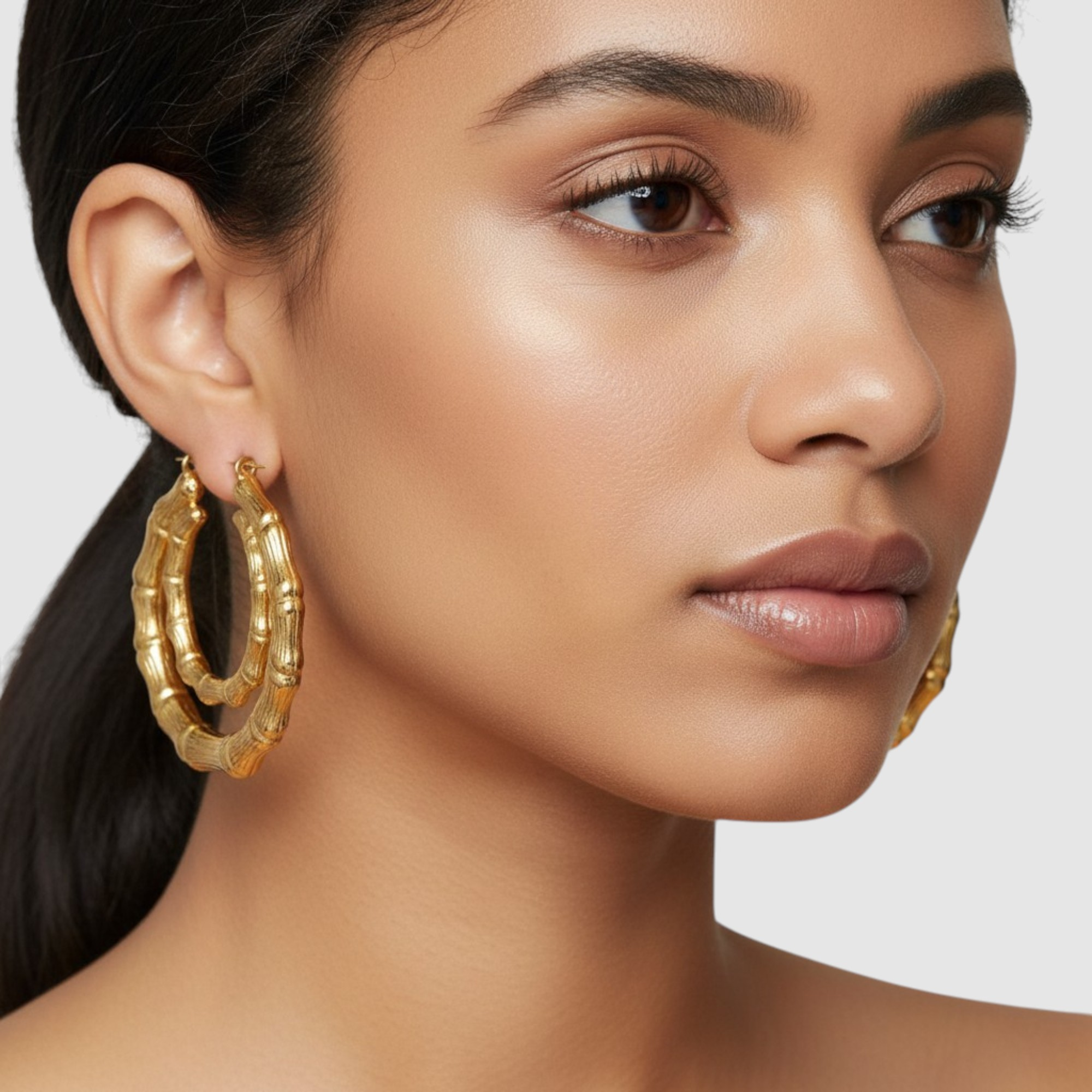 Aros Doble Bamboo en Oro Laminado 18K – Diseño Elegante y Brillo Duradero