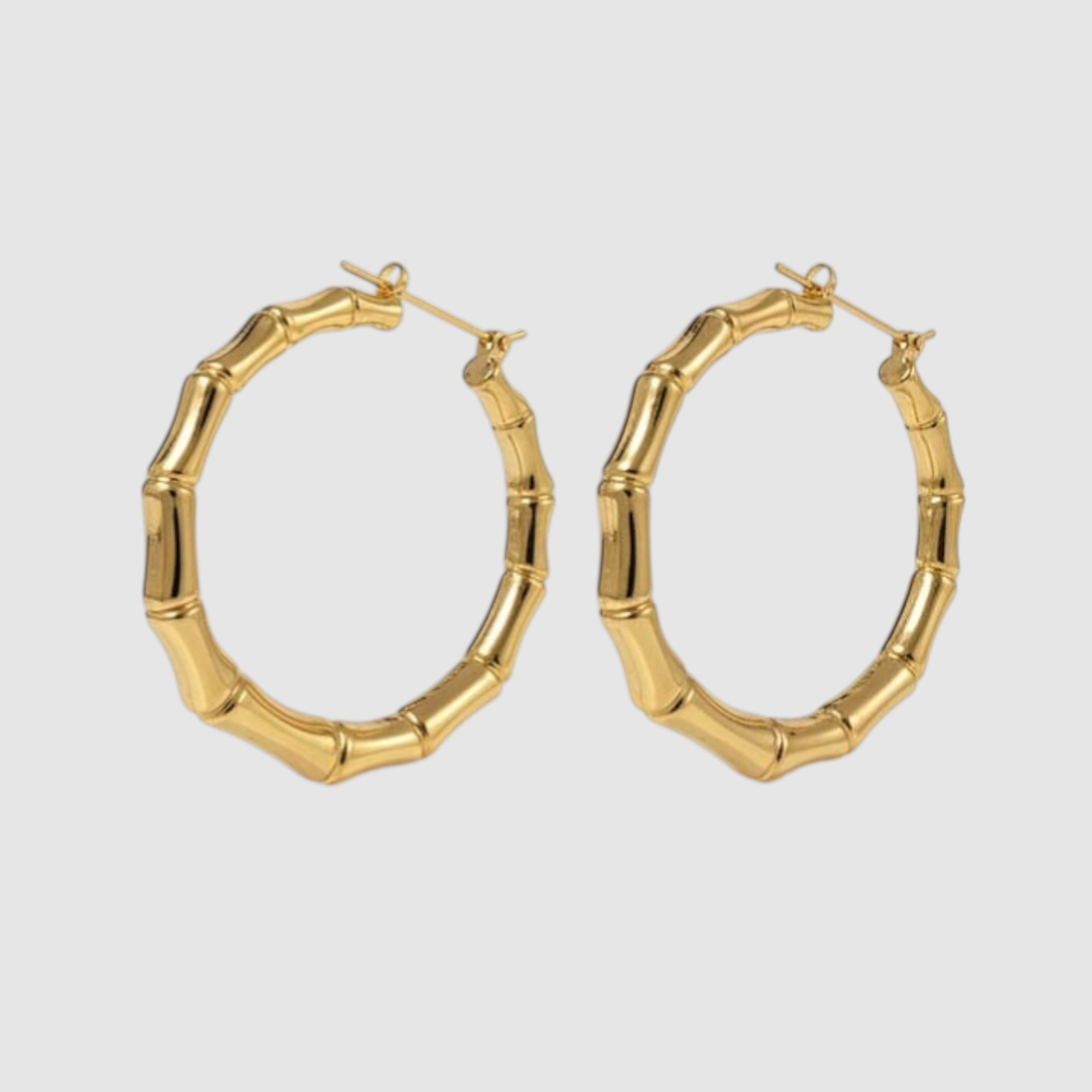 Aros Tipo Argolla Articulados Estilo Bambú en Oro Laminado 18K