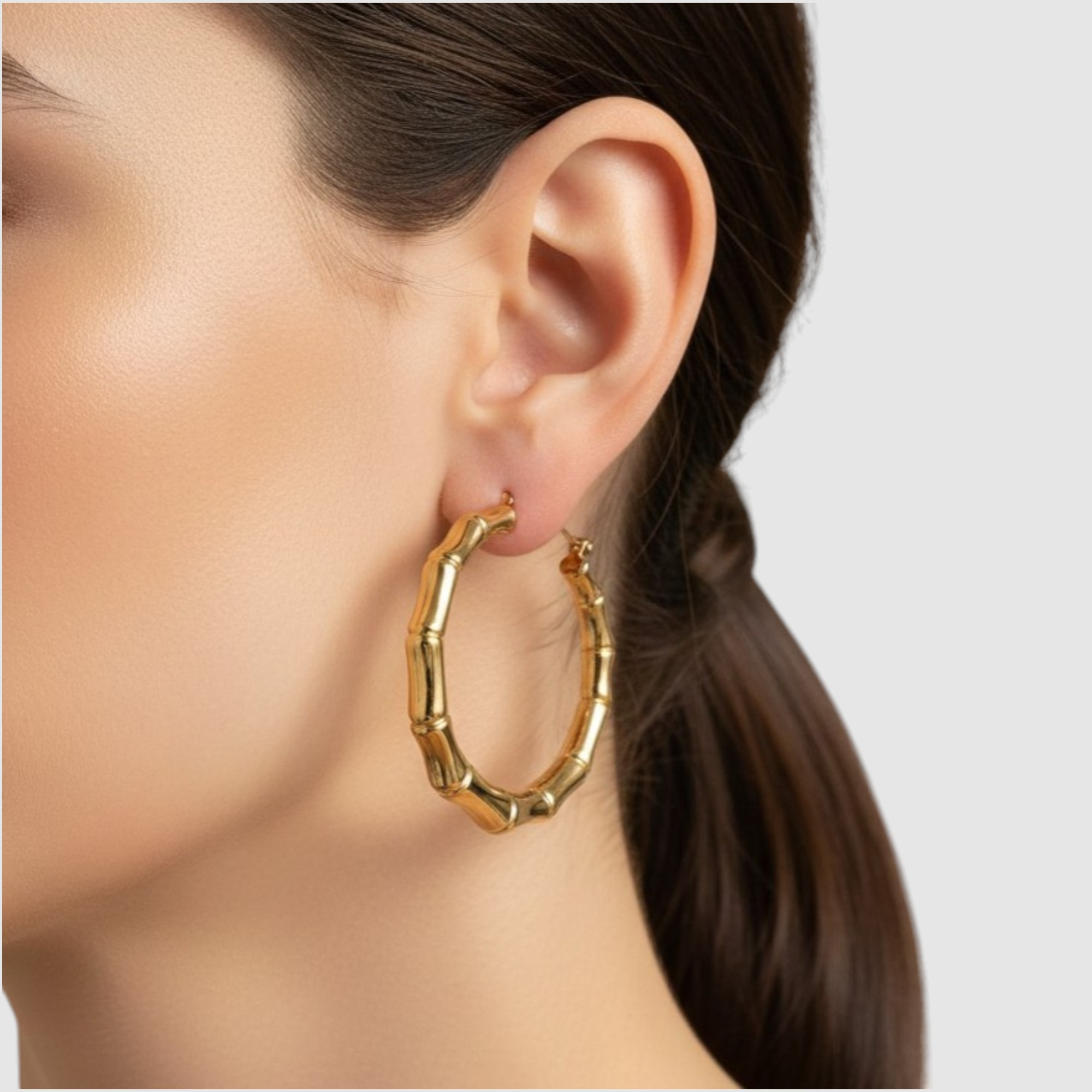 Argollas Tipo Aros Circulados Estilo Bambú en Oro Laminado 18K