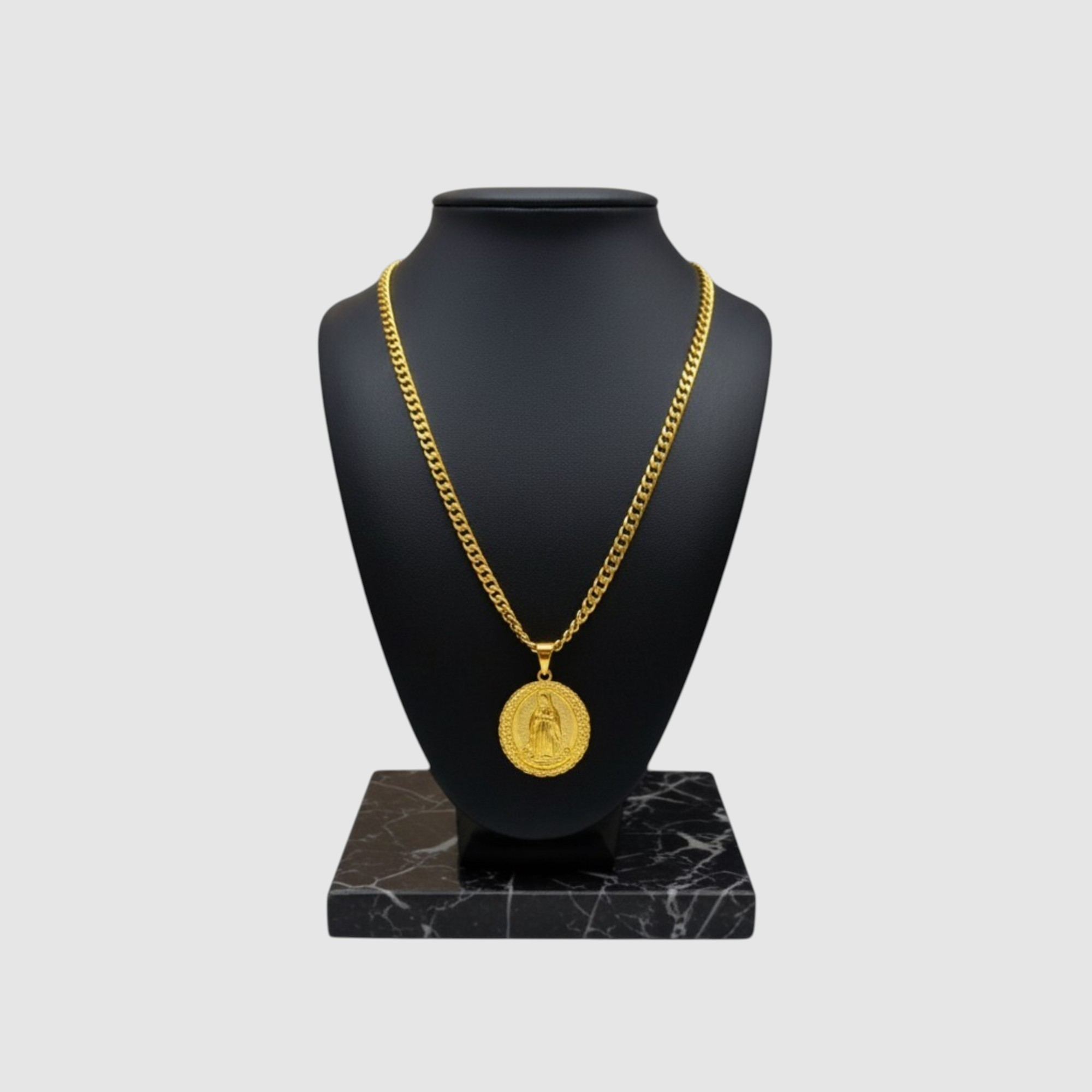 Cadena en oro laminado 14K con dije religioso