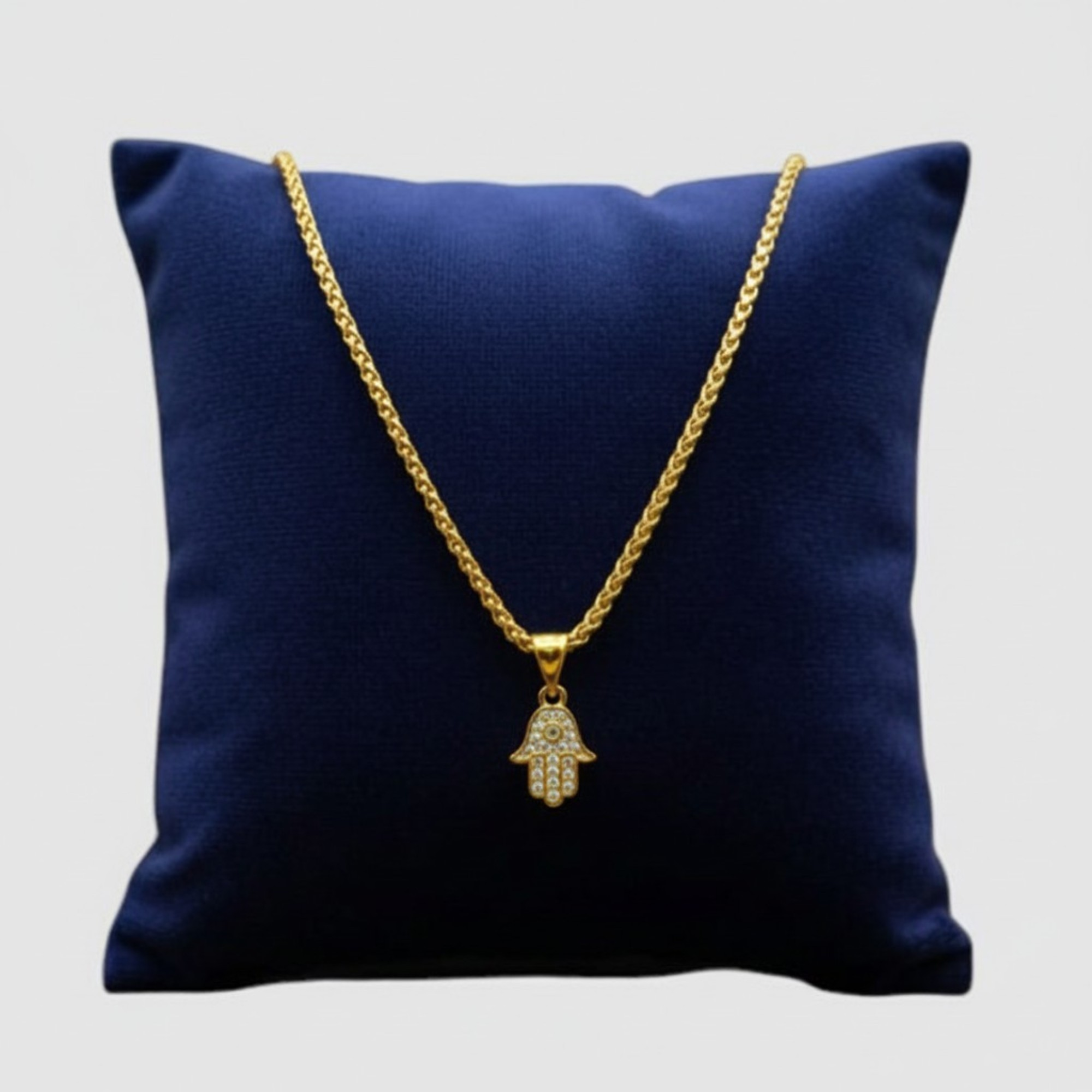 Cadena con dije de Mano Protectora en oro laminado 14K